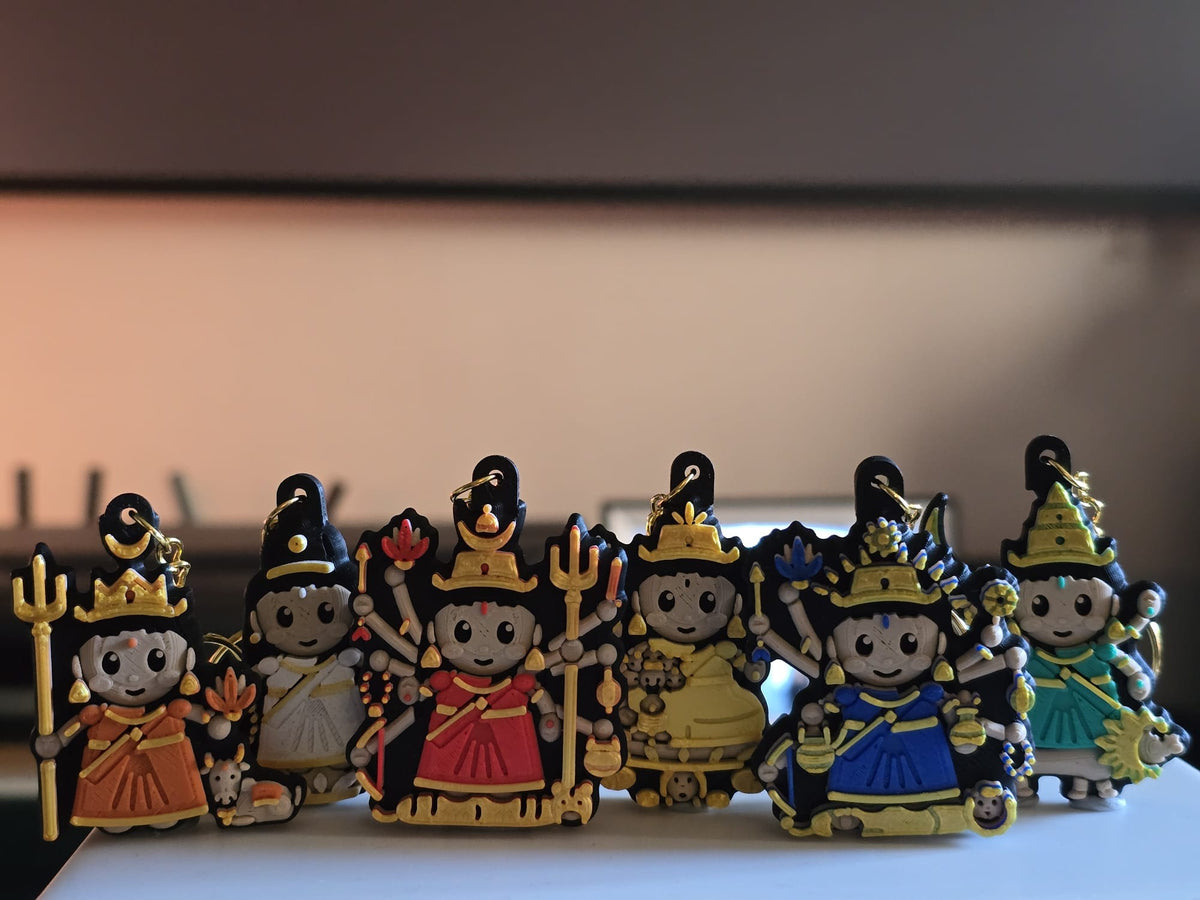 Navadurga keychains for nights one to six of Navratri: Shailaputri, Brahmacharini, Chandraghanta, Skandamata, Kushmanda and Katyayani in a row