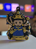 Kushmanda keychain: eight-armed chibi devi in a royal blue sari with a sun crown, two sacred pots and her lion at her feet
